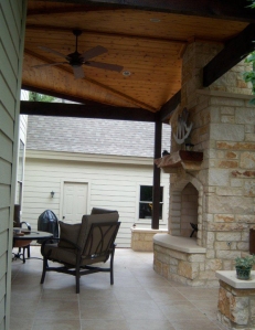 This patio and custom fireplace by Archadeck of Austin make the perfect pairing of style and beauty.