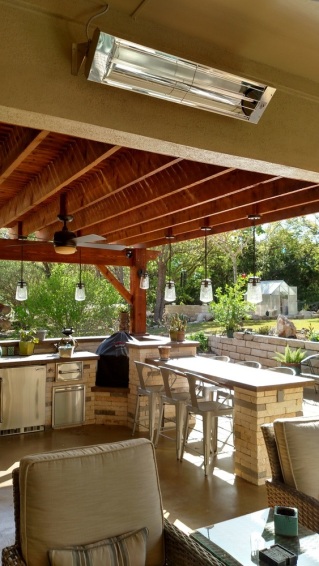 Austin porch and outdoor kitchen space showin infrared heating