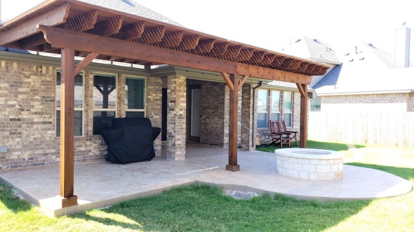 completed project in Liberty Hill, patio pergola and fire pit
